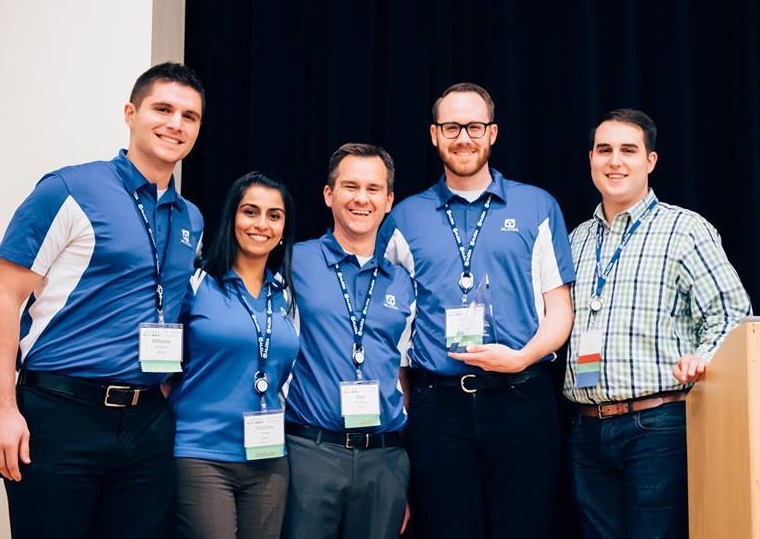 Picture of group holding award