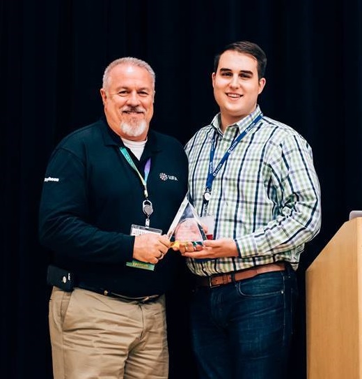 Image of person receiving award